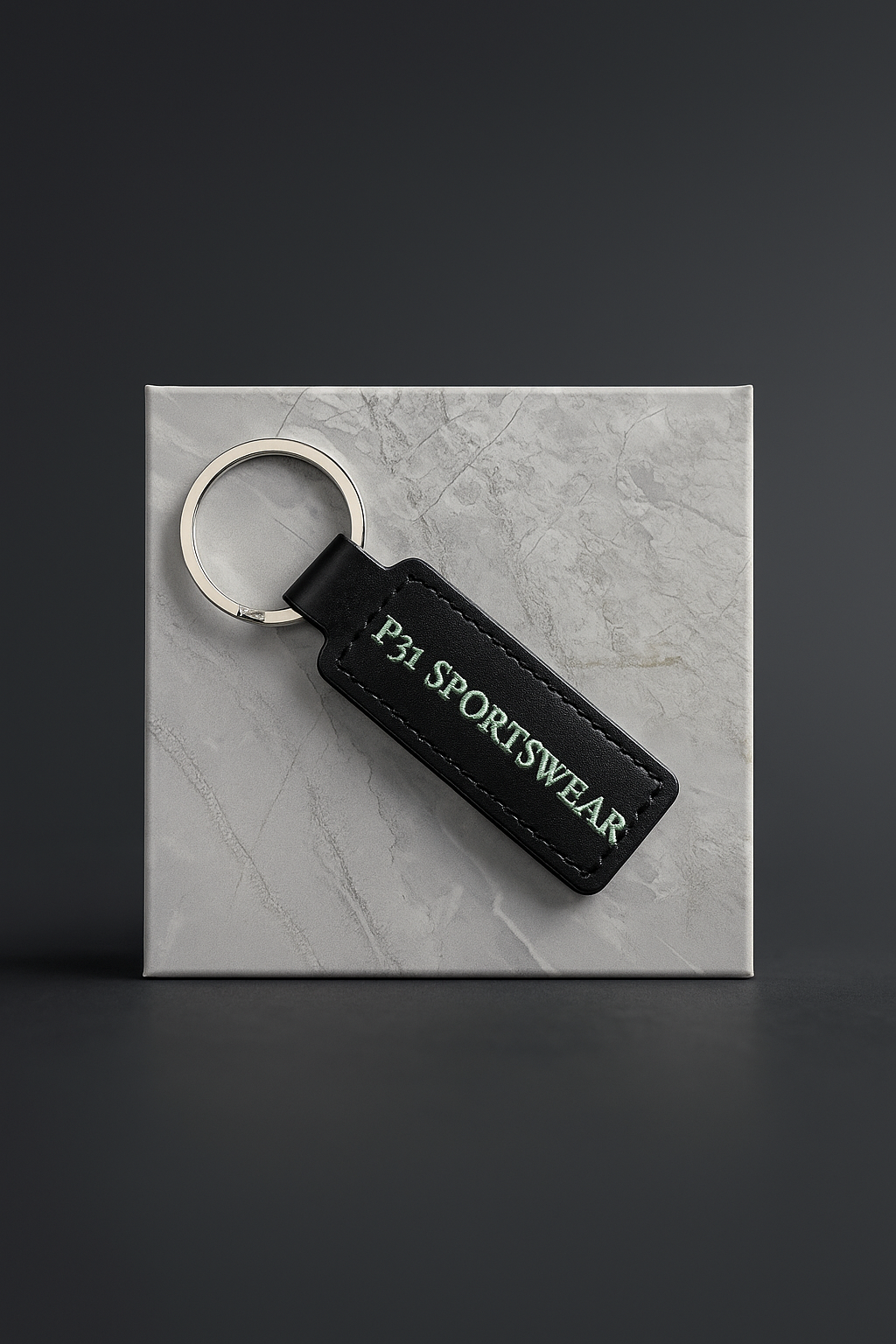 P31 SPORTSWEAR KEYCHAIN